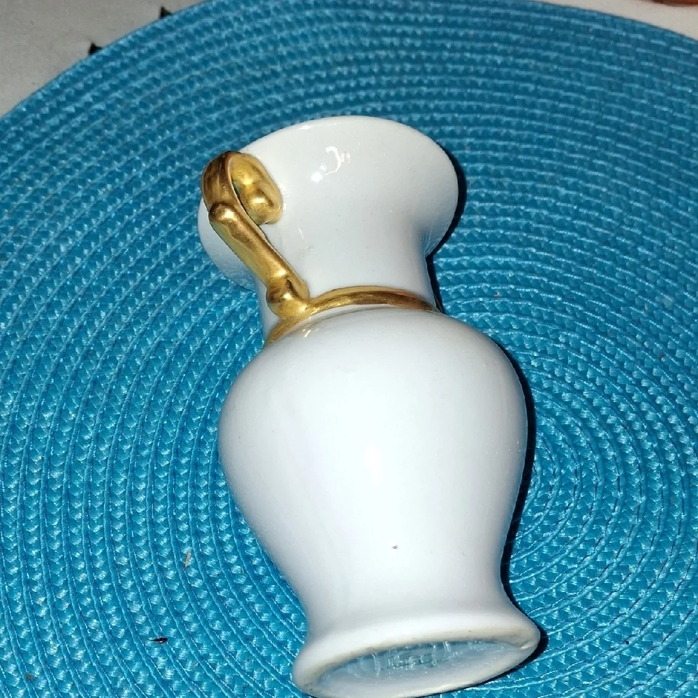 Elegant White Vase with Gold Accents